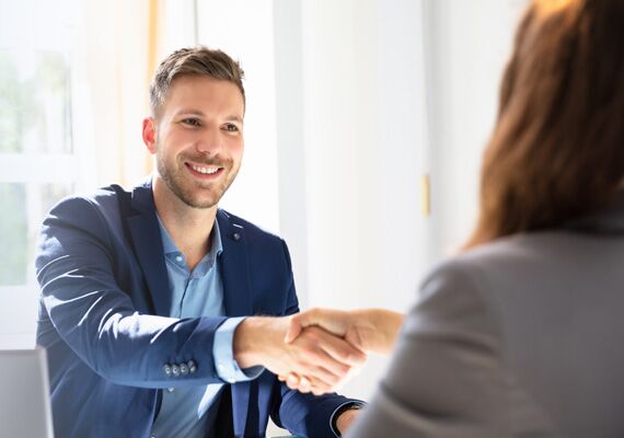 Business handshake meeting